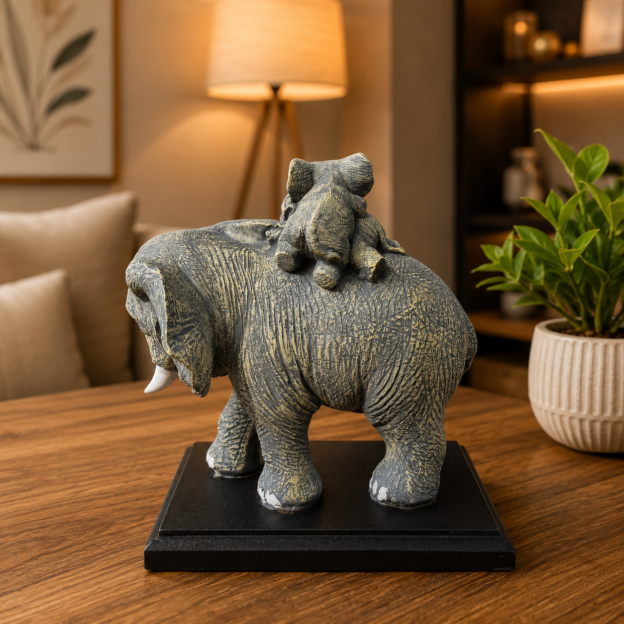 Mother Elephant with Baby on Her Calf